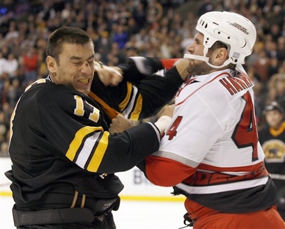 Jay Harrison, seen here fighting Milan Lucic, is now a member of the Winnipeg Jets.  (Picture courtesy of yahoo.com)