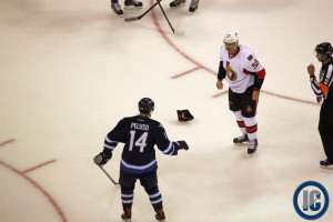 Peluso drops the gloves