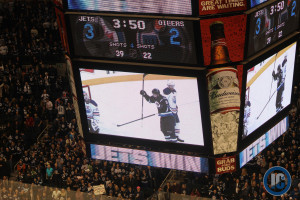 Jets beat Oilers 3-2 in OT