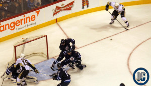 Crosby at the side of the net