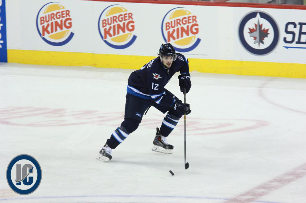 Stafford with puck