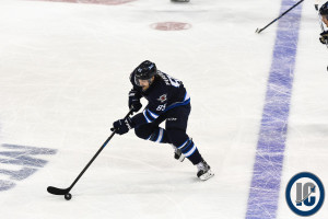 Perreault over blue line