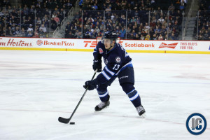 Petan with the puck