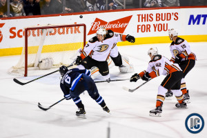 Winnipeg Jets Morning Papers 1 Alexander Burmistrov shoots on net