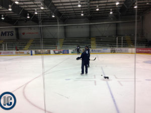 Mark Morrisson on the ice with Moose