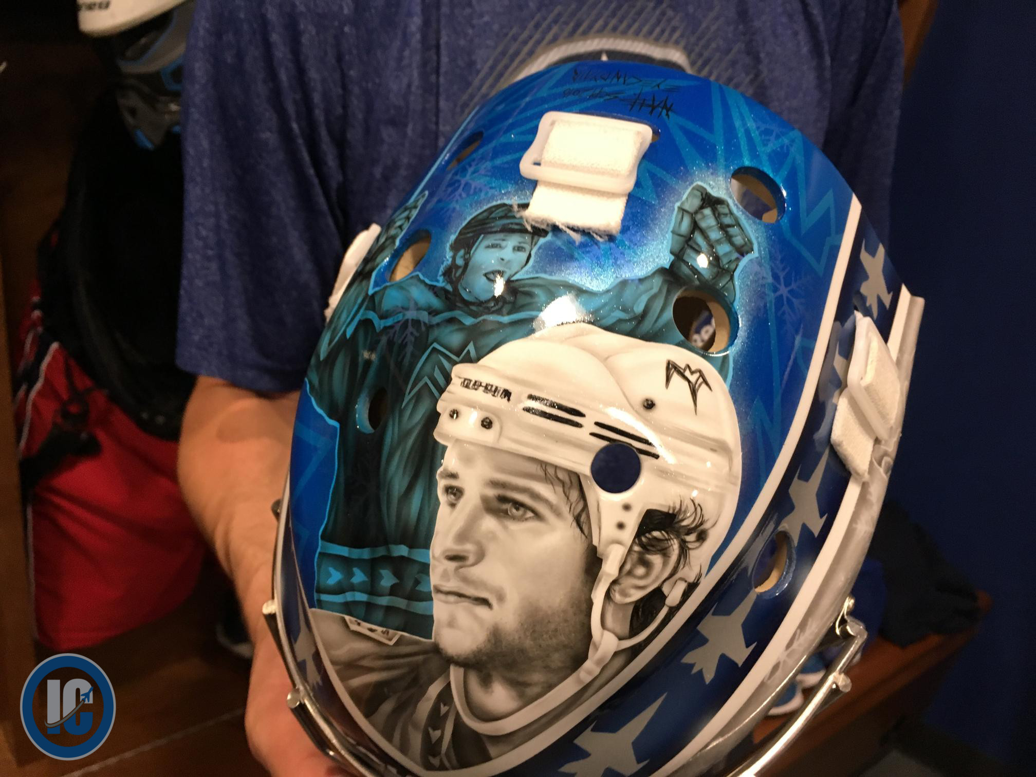 Connor Hellebuyck helmet top