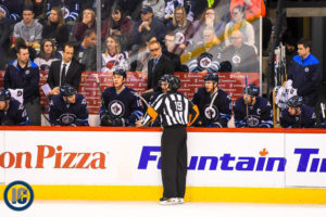 Coach Maurice chatting with ref
