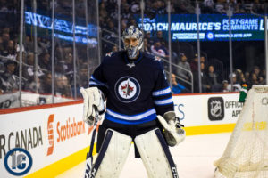 Connor Hellebuyck during commercial break
