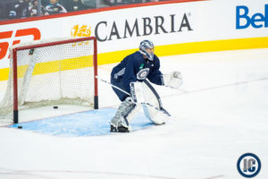 Connor Hellebuyck at practice