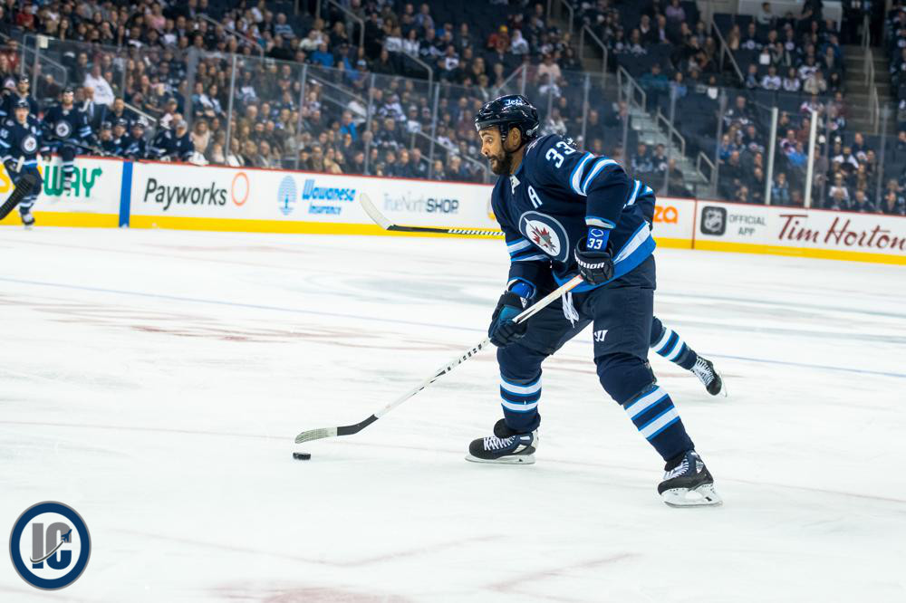 Dustin Byfuglien about to shoot