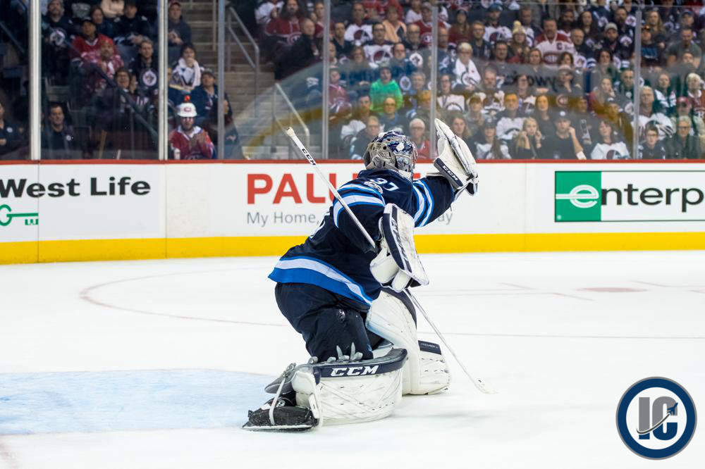 Hellebuyck makes the save