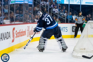 Winnipeg Jets Morning Papers 1 Connor Hellebuyck plays the puck