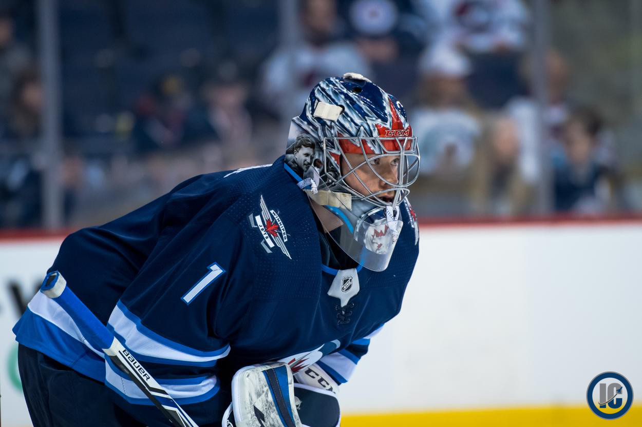 Eric Comrie in net for the Jets