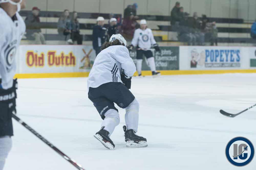 Mathieu Perreault skating up ice at IcePlex practice