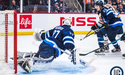 Hellebuyck makes the stop