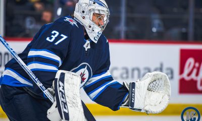 Connor Hellebuyck in practice