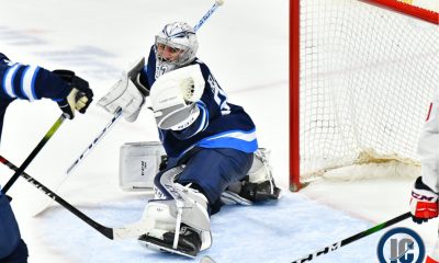 Connor Hellebuyck blanks Caps
