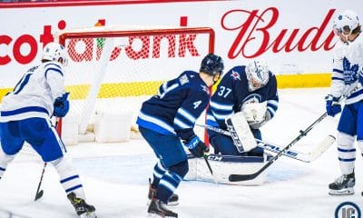 Hellebuyck makes save vs Leafs