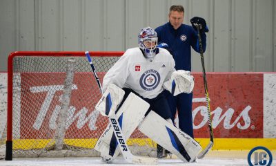 Eric Comrie with Wade Flaherty