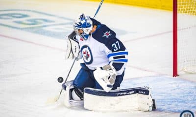 Connor Hellebuyck road save side
