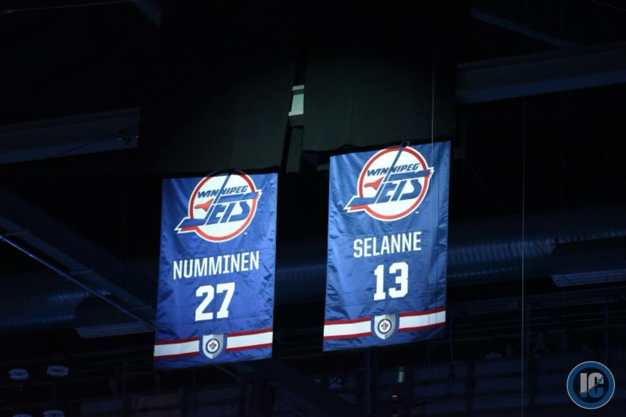 Numminen and Selanne in rafters