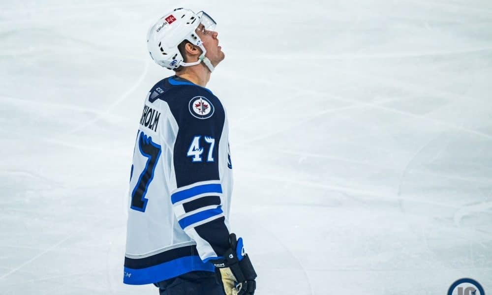 Jets sign Declan Chisholm to one-year, two-way contract