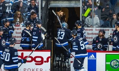 Jets lose to Sharks in OT