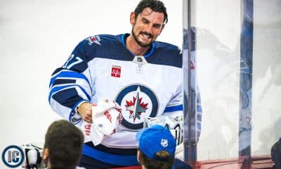 Connor Hellebuyck smiling